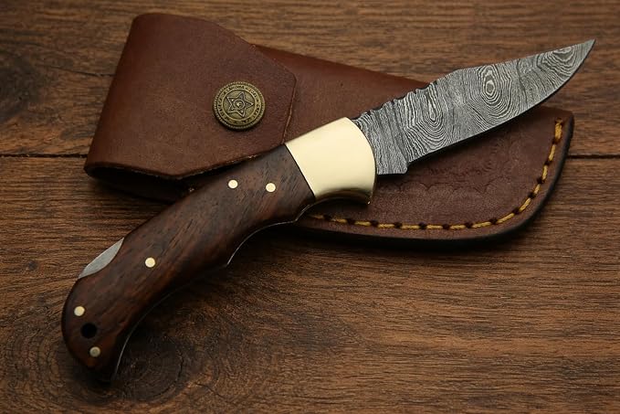 Damascus pocket knife with sheath product photograph