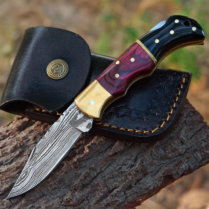 Handmade Damascus folding knife with wood handle product photograph